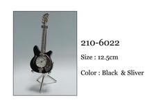 Powiększ zdjęcie Gitara z zegarkiem